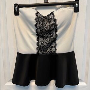 Strapless black and white peplum top